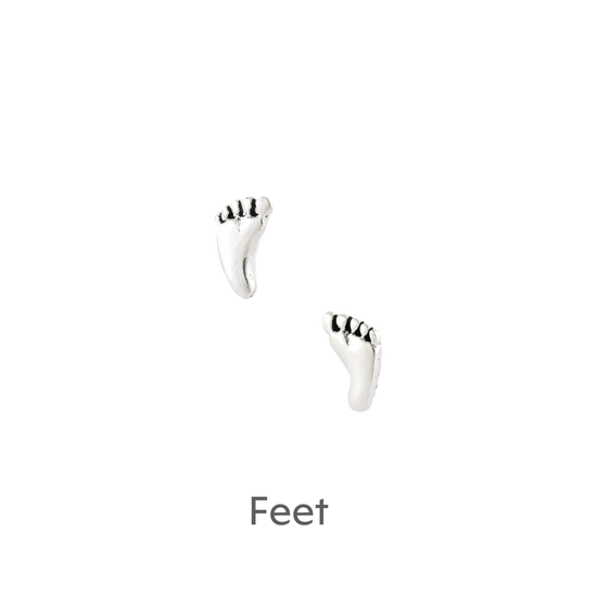 a pair of feet are shown in the dark