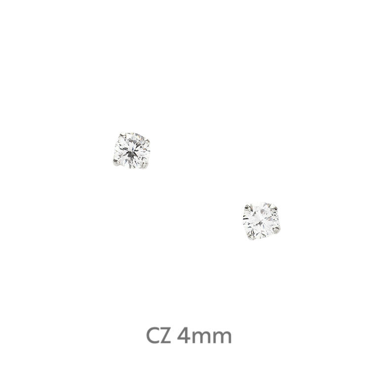 a pair of diamond earrings on a black background