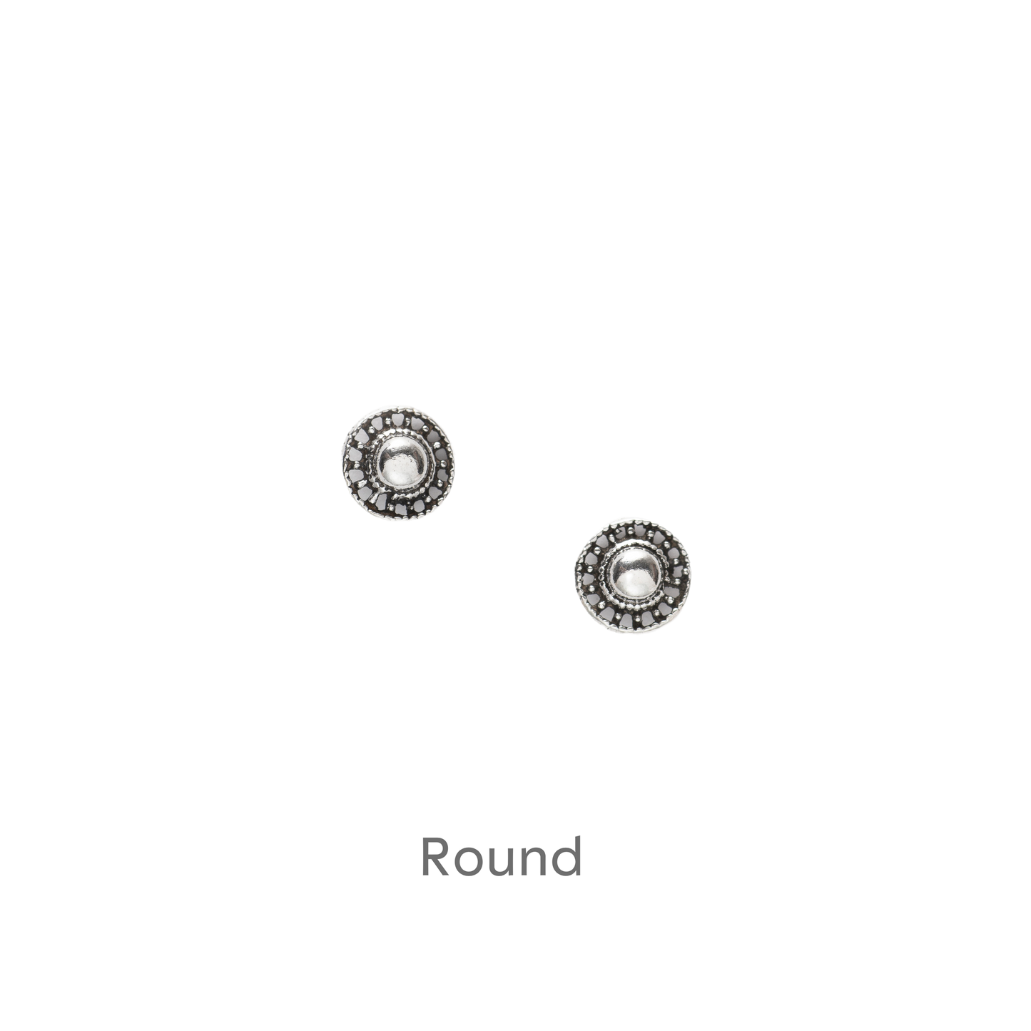 a pair of earrings on a black background