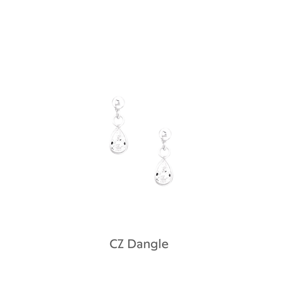 a pair of earrings on a black background